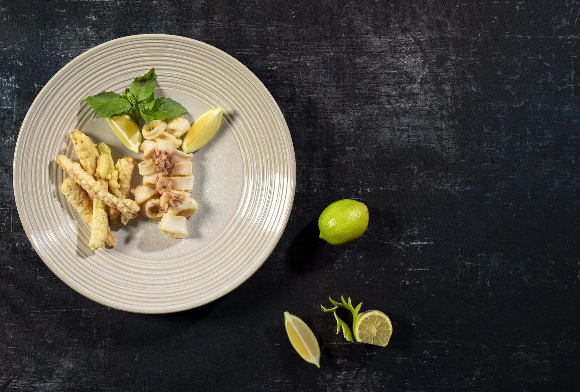 Moevenpick Resort & Marine Spa Sousse Eksteriør billede A plate of raw cuttlefish